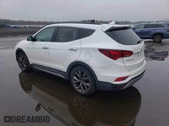 ✅ 2017 Hyundai Santa Fe Ultimate • VIN: 5NMZWDLA8HH048973 • Лот: 46044363. Опубликован ранее на Copart с пробегом 90 001 миль. Бесплатный доступ к архиву аукционных продаж из США и подробный отчёт об истории автомобиля на DreamBid. Изображение 2.