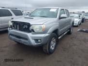 ✅ 2014 Toyota Tacoma PreRunner • VIN: 5TFJU4GN1EX052382 • Lot: 41533721. Listed on IAAI with 165,245 mi. Free auction sales archive from the USA and detailed vehicle history report at DreamBid. Image 2.