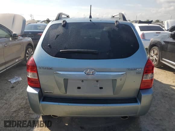 2006 Hyundai Tucson GLS z VIN KM8JN12D76U329514, wystawiony jako Copart lot #75214554 z przebiegiem 62 605 mil mil oraz Nie do naprawy • Non repairable. Historia ofert i sprzedaży dostępna na DreamBid. Obrazek 6.