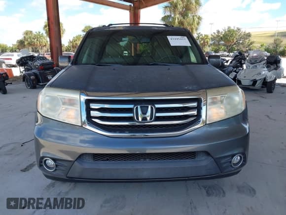 ✅ 2013 Honda Pilot EX-L • VIN: 5FNYF3H59DB001657 • Lot: 43445423. Listed on IAAI with 170,606 mi. Free auction sales archive from the USA and detailed vehicle history report at DreamBid. Image 12.