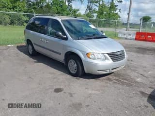 ✅ 2005 Chrysler Town & Country • VIN: 1C4GP45R75B102626 • Lot: 42490961. Listed on IAAI with 137,555 mi. Free auction sales archive from the USA and detailed vehicle history report at DreamBid. Image 1.