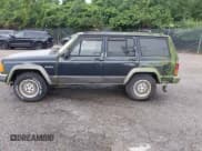 ✅ 1996 Jeep Cherokee • VIN: IJ4FJ78S0TL234609 • Lot: 42636385. Listed on IAAI with 163,885 mi. Free auction sales archive from the USA and detailed vehicle history report at DreamBid. Image 15.