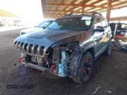 ✅ 2016 Jeep Cherokee Trailhawk • VIN: 1C4PJMBSXGW246224 • Lot: 43837921. Listed on IAAI with 104,876 mi. Free auction sales archive from the USA and detailed vehicle history report at DreamBid. Image 2.