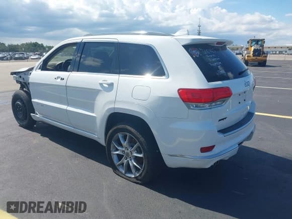✅ 2015 Jeep Grand Cherokee Summit • VIN: 1C4RJEJG5FC105038 • Lot: 42555024. Listed on IAAI with 133,077 mi. Free auction sales archive from the USA and detailed vehicle history report at DreamBid. Image 3.