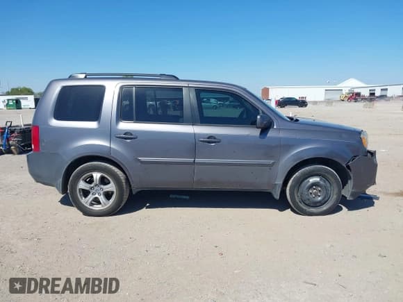 ✅ 2014 Honda Pilot EX-L • VIN: 5FNYF3H72EB015354 • Lot: 43403546. Listed on IAAI with 132,249 mi. Free auction sales archive from the USA and detailed vehicle history report at DreamBid. Image 13.