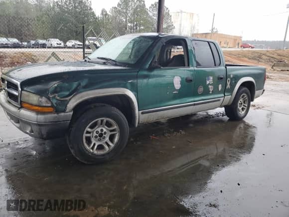 2003 Dodge Dakota SLT z VIN 1D7HL48X03S261436, wystawiony jako Copart lot #42317965 z przebiegiem 136 380 mil mil oraz Szkoda całkowita • Salvage title. Historia ofert i sprzedaży dostępna na DreamBid. Obrazek 1.