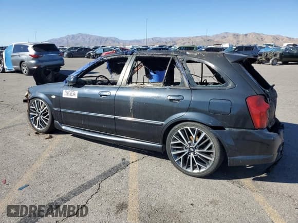 ✅ 2003 Mazda Protege • VIN: JM1BJ245031165150 • Lot: 75865654. Wystawiony na Copart z przebiegiem Nie podano. Bezpłatny archiwum sprzedaży aukcyjnych z USA i szczegółowy raport historii pojazdu na DreamBid. Zdjęcie 2.