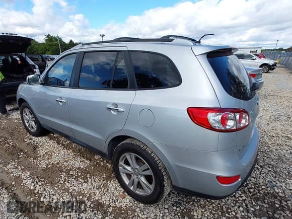 2010 Hyundai Santa Fe Limited with VIN 5NMSKDAG5AH388480, listed as a IAAI auction lot 43391801 with 109,365 mi miles and . Bid and sale history available at DreamBid. Image 3.