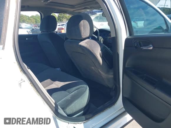 ✅ 2015 Chevrolet Impala LT • VIN: 2G1WB5E37F1122056 • Лот: 43170781. Опубликован ранее на IAAI с пробегом 236 421 миль. Бесплатный доступ к архиву аукционных продаж из США и подробный отчёт об истории автомобиля на DreamBid. Изображение 8.