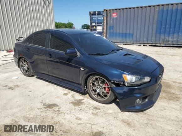 ✅ 2014 Mitsubishi Lancer Evolution MR • VIN: JA32W5FV7EU014404 • Лот: 68038964. Опубликован ранее на Copart с пробегом 106 384 миль. Бесплатный доступ к архиву аукционных продаж из США и подробный отчёт об истории автомобиля на DreamBid. Изображение 4.