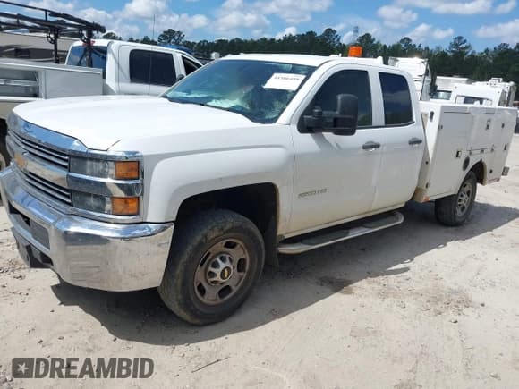 ✅ 2015 Chevrolet Silverado 2500HD Work Truck • VIN: 1GB2CUEG8FZ500140 • Lot: 41886489. Listed on IAAI with 242,400 mi. Free auction sales archive from the USA and detailed vehicle history report at DreamBid. Image 2.