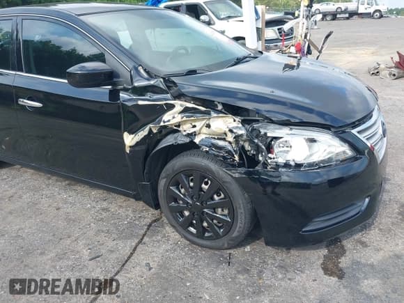 ✅ 2015 Nissan Sentra S • VIN: 3N1AB7AP7FY227612 • Lot: 42287836. Listed on IAAI with 138,384 mi. Free auction sales archive from the USA and detailed vehicle history report at DreamBid. Image 6.