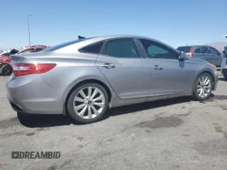 ✅ 2013 Hyundai Azera • VIN: KMHFH4JG6DA199492 • Лот: 61403195. Опубликован ранее на Copart с пробегом 107 506 миль. Бесплатный доступ к архиву аукционных продаж из США и подробный отчёт об истории автомобиля на DreamBid. Изображение 3.