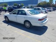 ✅ 1999 Toyota Camry LE • VIN: JT2BF22K0X0218671 • Lot: 42997383. Wystawiony na IAAI z przebiegiem 208 788 mil. Bezpłatny archiwum sprzedaży aukcyjnych z USA i szczegółowy raport historii pojazdu na DreamBid. Zdjęcie 3.