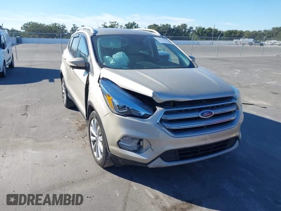 ✅ 2017 Ford Escape Titanium • VIN: 1FMCU0JD6HUD58495 • Lot: 43617499. Wystawiony na IAAI z przebiegiem 118 379 mil. Bezpłatny archiwum sprzedaży aukcyjnych z USA i szczegółowy raport historii pojazdu na DreamBid. Zdjęcie 1.
