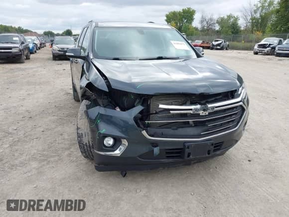 2019 Chevrolet Traverse LT Cloth z VIN 1GNEVMKW7KJ238111, wystawiony jako IAAI lot #43282872 z przebiegiem 122 571 mil mil oraz . Historia ofert i sprzedaży dostępna na DreamBid. Obrazek 6.
