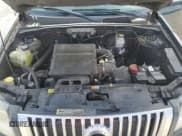 ✅ 2009 Mercury Mariner Premier • VIN: 4M2CU87GX9KJ18412 • Lot: 65004665. Wystawiony na Copart z przebiegiem 198 272 mil. Bezpłatny archiwum sprzedaży aukcyjnych z USA i szczegółowy raport historii pojazdu na DreamBid. Zdjęcie 12.