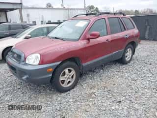 2002 Hyundai Santa Fe GLS z VIN KM8SC73D72U306997, wystawiony jako IAAI lot #41519773 z przebiegiem 244 398 mil mil oraz . Historia ofert i sprzedaży dostępna na DreamBid. Obrazek 2.