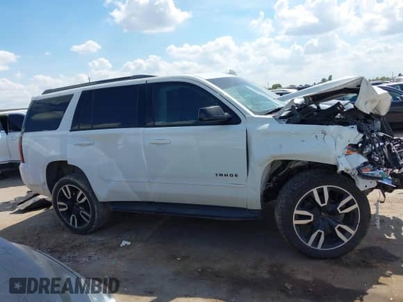2020 Chevrolet Tahoe Premier with VIN 1GNSKCKJ8LR134496, listed as a IAAI auction lot 43360495 with 118,770 mi miles and . Bid and sale history available at DreamBid. Image 13.