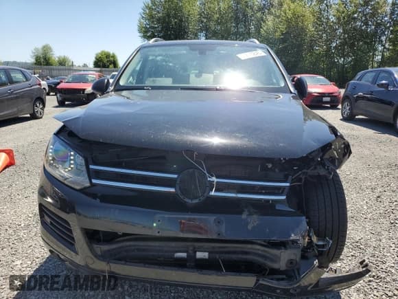 ✅ 2013 Volkswagen Touareg Lux • VIN: WVGEF9BP0DD001565 • Lot: 63070845. Listed on Copart with 123,788 mi. Free auction sales archive from the USA and detailed vehicle history report at DreamBid. Image 5.