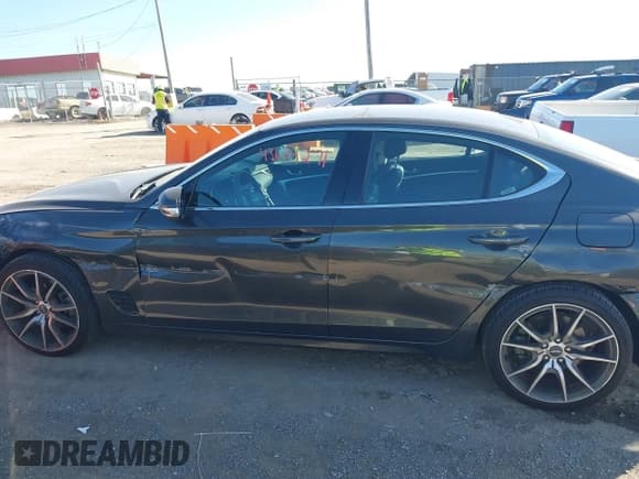 ✅ 2023 Genesis G70 2.0T • VIN: KMTG34TA4PU131180 • Lot: 43634271. Wystawiony na IAAI z przebiegiem 14 615 mil. Bezpłatny archiwum sprzedaży aukcyjnych z USA i szczegółowy raport historii pojazdu na DreamBid. Zdjęcie 14.