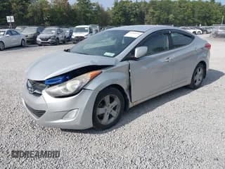 ✅ 2013 Hyundai Elantra GLS • VIN: KMHDH4AE7DU858457 • Lot: 43241444. Listed on IAAI with 153,661 mi. Free auction sales archive from the USA and detailed vehicle history report at DreamBid. Image 2.