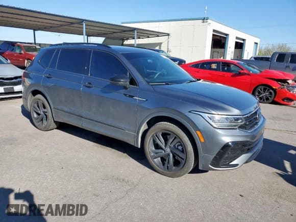 ✅ 2023 Volkswagen Tiguan SE R-Line Black • VIN: 3VVCB7AX7PM065464 • Лот: 71364395. Опубликован ранее на Copart с пробегом 20 505 миль. Бесплатный доступ к архиву аукционных продаж из США и подробный отчёт об истории автомобиля на DreamBid. Изображение 4.