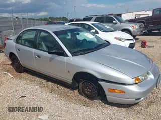 2002 Saturn SL with VIN 1G8ZF52842Z147985, listed as a IAAI auction lot 42601452 with 50,301 mi miles and . Bid and sale history available at DreamBid. Image 1.