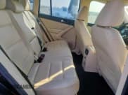 ✅ 2016 Volkswagen Tiguan S • VIN: WVGAV7AXXGW553137 • Lot: 93170055. Listed on Copart with 122,972 mi. Free auction sales archive from the USA and detailed vehicle history report at DreamBid. Image 10.