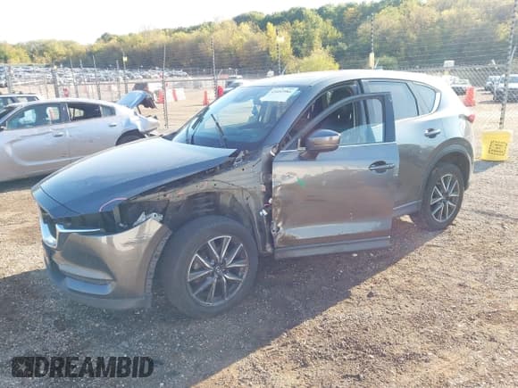 ✅ 2017 Mazda CX-5 Grand Touring • VIN: JM3KFBDL2H0151481 • Лот: 43452984. Опубликован ранее на IAAI с пробегом 119 413 миль. Бесплатный доступ к архиву аукционных продаж из США и подробный отчёт об истории автомобиля на DreamBid. Изображение 18.