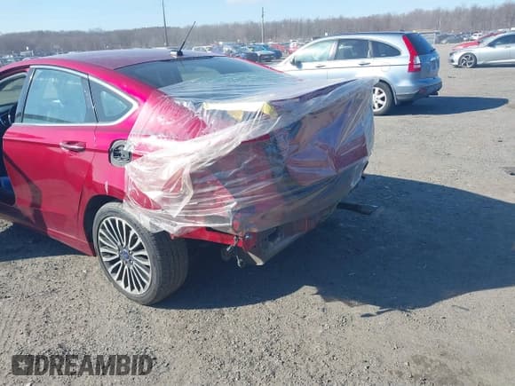 ✅ 2018 Ford Fusion Titanium • VIN: 3FA6P0SU3JR106441 • Lot: 41699936. Listed on IAAI with 146,330 mi. Free auction sales archive from the USA and detailed vehicle history report at DreamBid. Image 6.