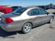 ✅ 2002 Ford Taurus SE Standard • VIN: 1FAFP53U02A138545 • Lot: 43353758. Listed on IAAI with 90,603 mi. Free auction sales archive from the USA and detailed vehicle history report at DreamBid. Image 4.