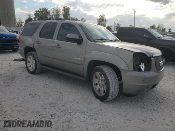 ✅ 2009 GMC Yukon SLT 4SA • VIN: 1GKFK33089R183940 • Lot: 82261835. Listed on Copart with 196,844 mi. Free auction sales archive from the USA and detailed vehicle history report at DreamBid. Image 4.