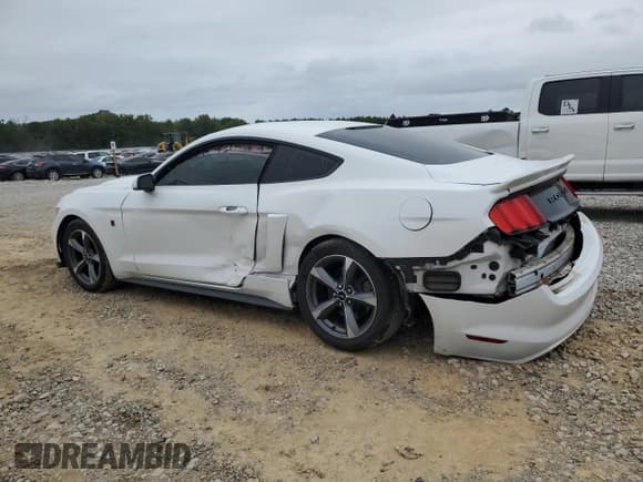 ✅ 2015 Ford Mustang V6 • VIN: 1FA6P8AM7F5315272 • Lot: 84479565. Listed on Copart with 130,157 mi. Free auction sales archive from the USA and detailed vehicle history report at DreamBid. Image 2.