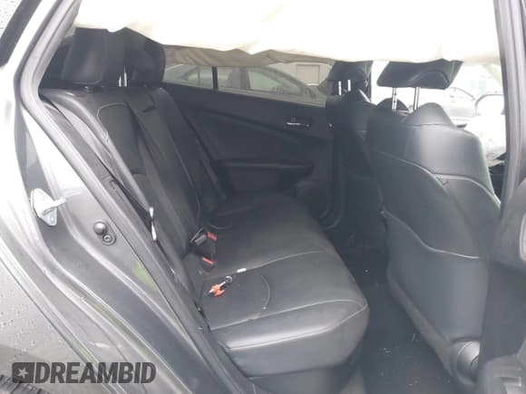 ✅ 2020 Toyota Prius Limited • VIN: JTDKARFP7L3163312 • Lot: 43738073. Wystawiony na IAAI z przebiegiem 215 050 mil. Bezpłatny archiwum sprzedaży aukcyjnych z USA i szczegółowy raport historii pojazdu na DreamBid. Zdjęcie 8.