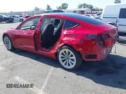 ✅ 2021 Tesla Model 3 Long Range • VIN: 5YJ3E1EB6MF879669 • Lot: 42332384. Wystawiony na IAAI z przebiegiem 81 548 mil. Bezpłatny archiwum sprzedaży aukcyjnych z USA i szczegółowy raport historii pojazdu na DreamBid. Zdjęcie 3.