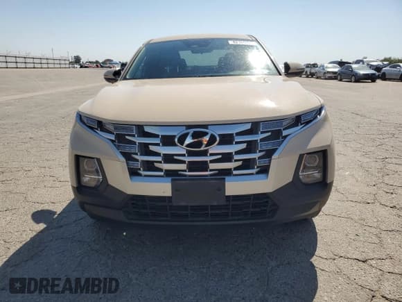 ✅ 2022 Hyundai Santa Cruz SEL • VIN: 5NTJBDAE6NH008552 • Lot: 82109745. Listed on Copart with 45,686 mi. Free auction sales archive from the USA and detailed vehicle history report at DreamBid. Image 5.
