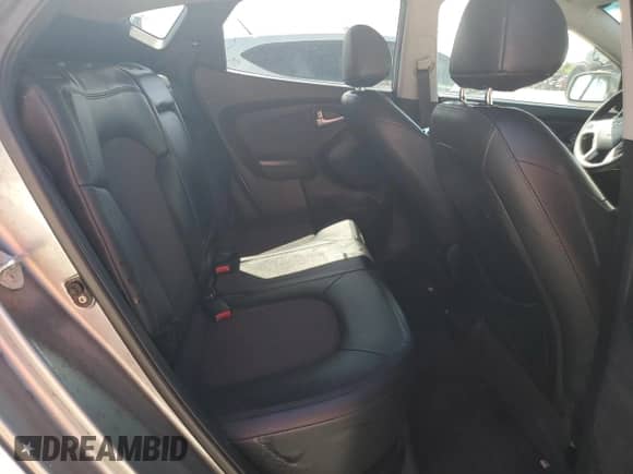 2013 Hyundai Tucson GLS z VIN KM8JU3ACXDU769974, wystawiony jako Copart lot #68220165 z przebiegiem 78 987 mil mil oraz Czysty tytuł • Clean title. Historia ofert i sprzedaży dostępna na DreamBid. Obrazek 11.