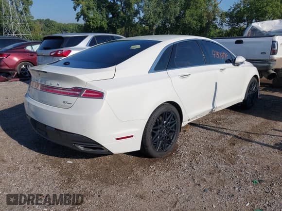 ✅ 2013 Lincoln MKZ • VIN: 3LN6L2JK5DR801389 • Lot: 42904104. Wystawiony na IAAI z przebiegiem 129 813 mil. Bezpłatny archiwum sprzedaży aukcyjnych z USA i szczegółowy raport historii pojazdu na DreamBid. Zdjęcie 4.