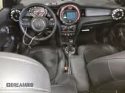 ✅ 2021 MINI Convertible Cooper • VIN: WMWWJ3C04M3N17758 • Лот: 60411294. Опубликован ранее на Copart с пробегом 3 881 миль. Бесплатный доступ к архиву аукционных продаж из США и подробный отчёт об истории автомобиля на DreamBid. Изображение 8.