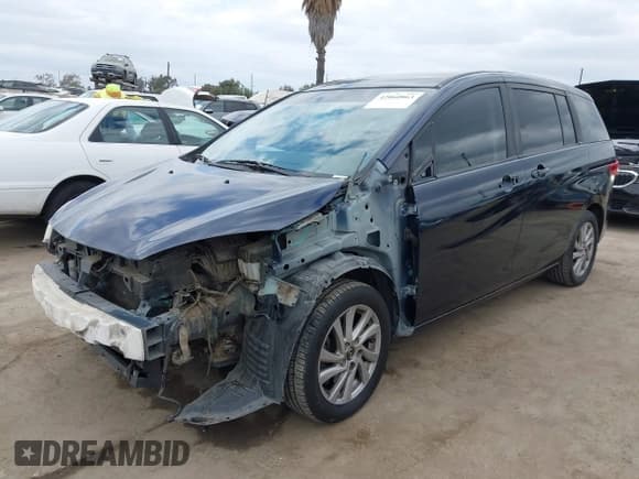 ✅ 2014 Mazda 5 Sport • VIN: JM1CW2BL1E0176111 • Lot: 42060863. Listed on IAAI with 121,814 mi. Free auction sales archive from the USA and detailed vehicle history report at DreamBid. Image 2.