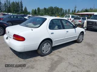 ✅ 1993 Nissan Altima GLE • VIN: 1N4BU31FXPC233738 • Lot: 42475896. Listed on IAAI with 159,382 mi. Free auction sales archive from the USA and detailed vehicle history report at DreamBid. Image 4.