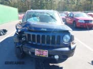 ✅ 2014 Jeep Patriot Latitude • VIN: 1C4NJRFB3ED821044 • Lot: 43503686. Listed on IAAI with 185,115 mi. Free auction sales archive from the USA and detailed vehicle history report at DreamBid. Image 6.