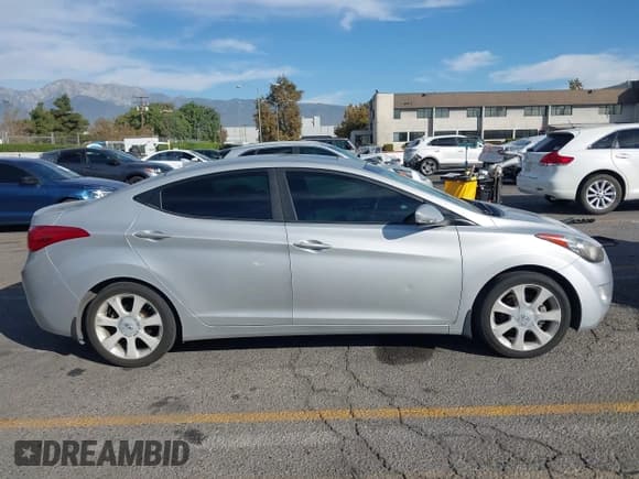 ✅ 2013 Hyundai Elantra GLS • VIN: KMHDH4AE5DU918428 • Lot: 43577973. Listed on IAAI with 116,708 mi. Free auction sales archive from the USA and detailed vehicle history report at DreamBid. Image 13.
