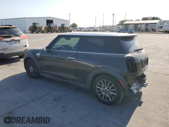2014 MINI Hardtop S with VIN WMWXM7C59ET987820, listed as a Copart auction lot 59164955 with 77,699 mi miles and Salvage title. Bid and sale history available at DreamBid. Image 2.