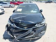 ✅ 2017 Chevrolet Cruze Premier • VIN: 3G1BF6SM1HS525043 • Lot: 43186518. Listed on IAAI with 53,990 mi. Free auction sales archive from the USA and detailed vehicle history report at DreamBid. Image 12.