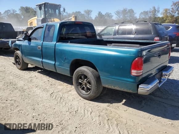 ✅ 1998 Dodge Dakota SLT • VIN: 1B7GL22XXWS571049 • Lot: 75878644. Wystawiony na Copart z przebiegiem Nie podano. Bezpłatny archiwum sprzedaży aukcyjnych z USA i szczegółowy raport historii pojazdu na DreamBid. Zdjęcie 2.