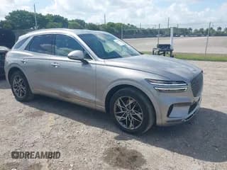 ✅ 2022 Genesis GV70 2.5T • VIN: KMUMADTB4NU059911 • Лот: 42149577. Опубликован ранее на IAAI с пробегом 22 070 миль. Бесплатный доступ к архиву аукционных продаж из США и подробный отчёт об истории автомобиля на DreamBid. Изображение 1.