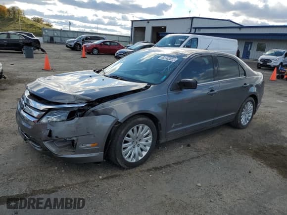 ✅ 2011 Ford Fusion Hybrid • VIN: 3FADP0L38BR214858 • Lot: 82742055. Listed on Copart with 186,252 mi. Free auction sales archive from the USA and detailed vehicle history report at DreamBid. Image 1.