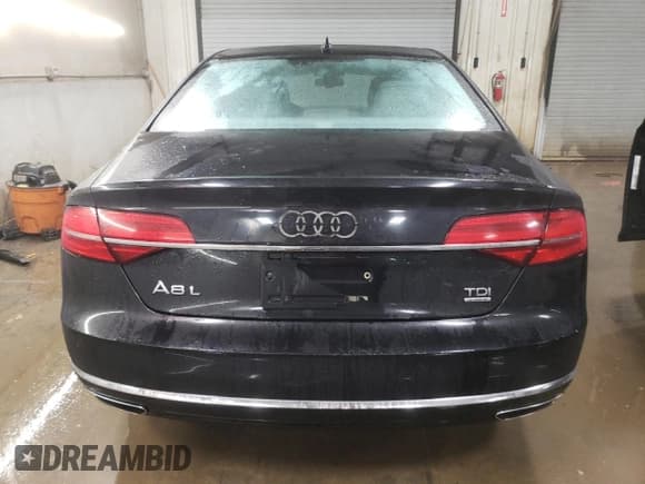 ✅ 2015 Audi A8 3.0L TDI • VIN: WAU3MAFD1FN026648 • Лот: 83956804. Опубликован ранее на Copart с пробегом 171 089 миль. Бесплатный доступ к архиву аукционных продаж из США и подробный отчёт об истории автомобиля на DreamBid. Изображение 6.